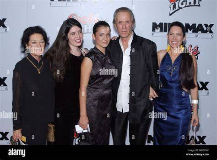 David Carradine posing with wife and kids at the "KILL BILL VOL.1