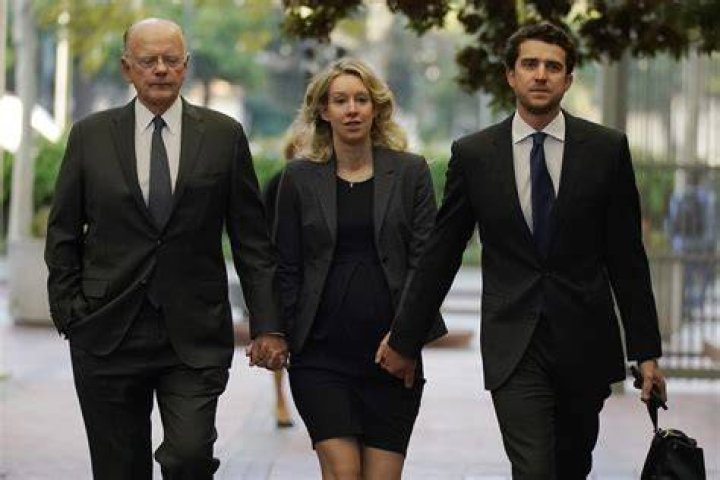 Elizabeth Holmes prison Theranos whistleblower slept with knife Fortune