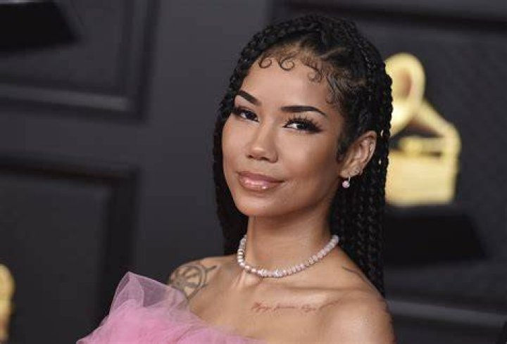 Jhene Aiko's father Dr. Karamo Chilombo his NINTH child at age
