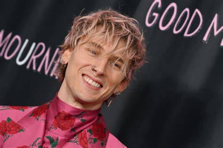 Machine Gun Kelly goes for a jog with his daughter Casie, 11, amid