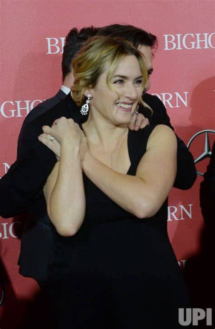 Photo Kate Winslet anf Johnny Depp attend the Palm Springs