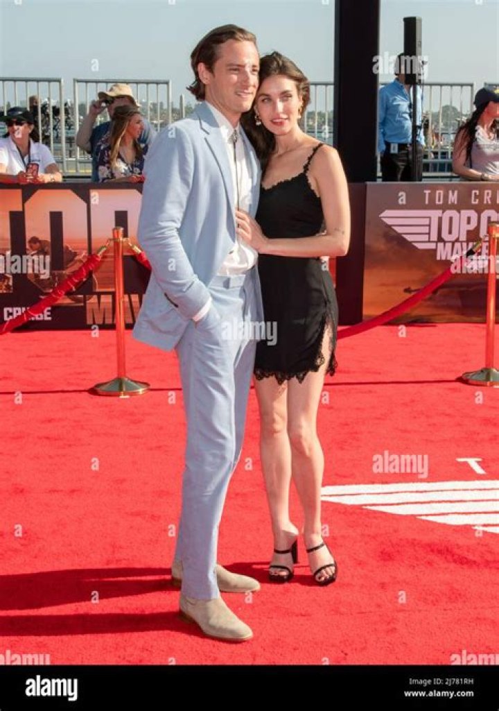 Top Gun Premiere Rainey Qualley, Lewis Pullman Make Red Carpet Debut